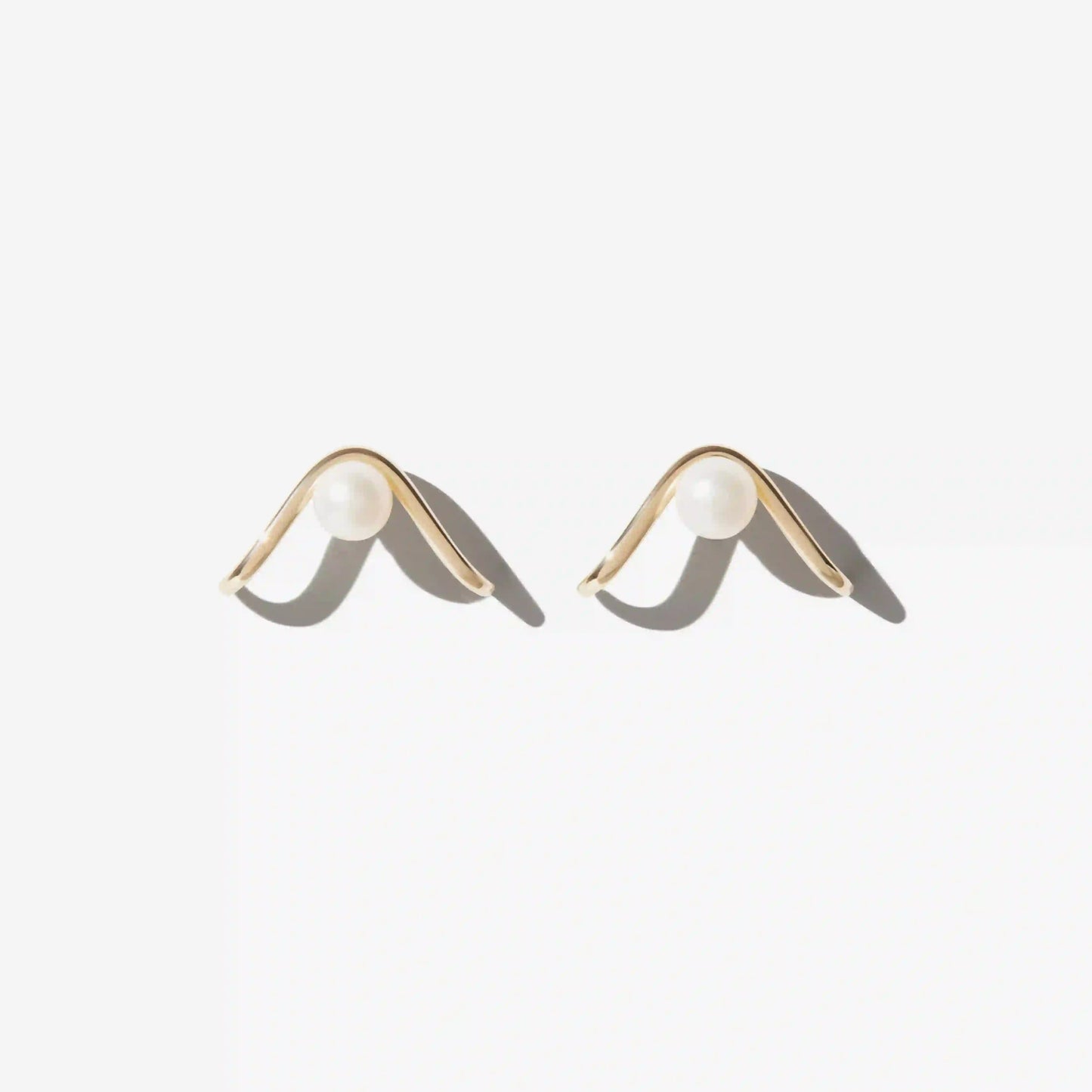 Gold and Pearl Curve Earring