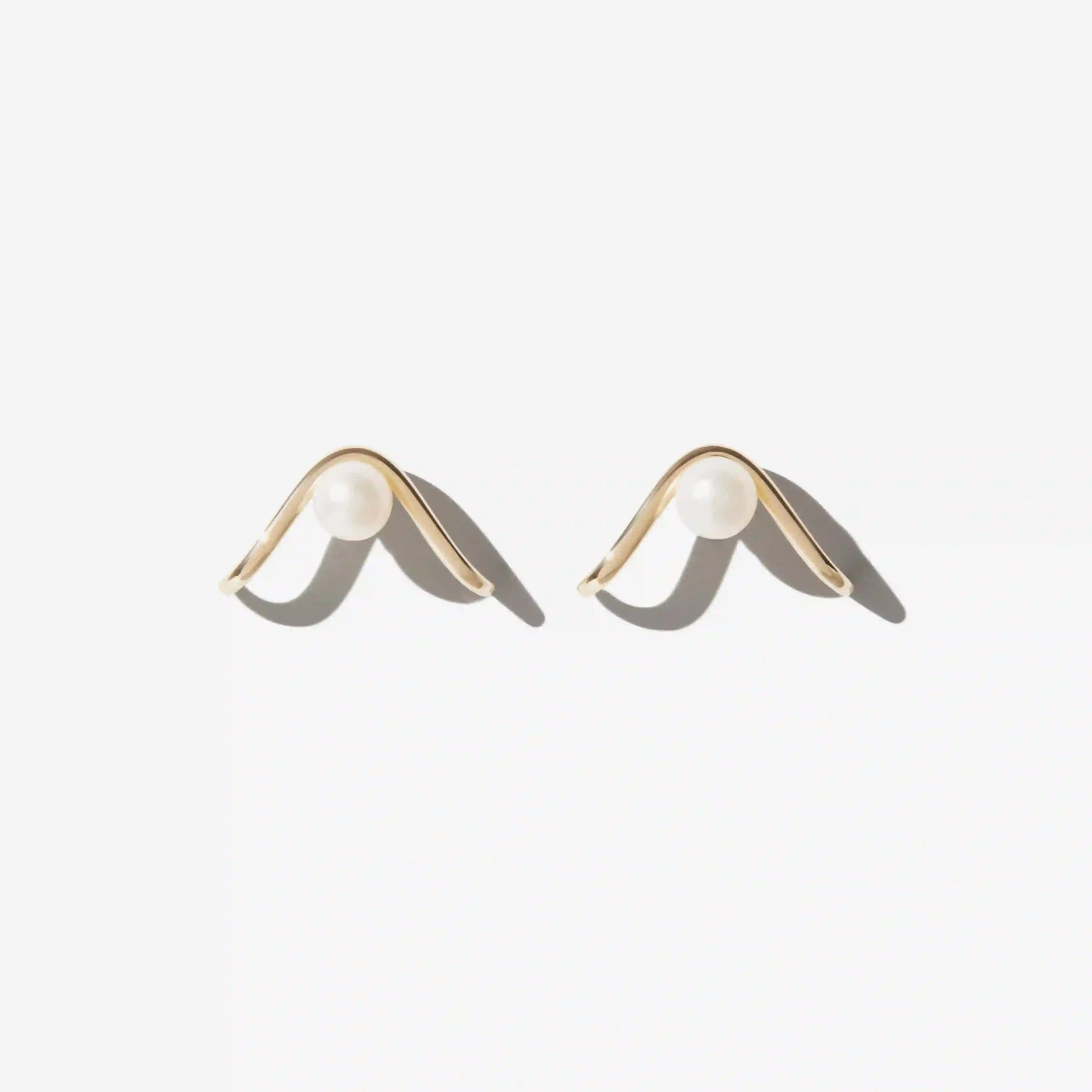 Gold and Pearl Curve Earring