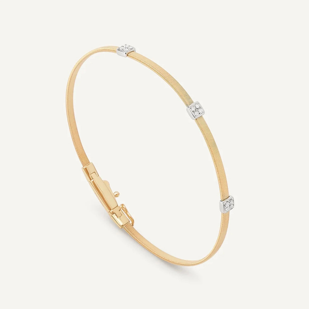 Yellow Gold Coil Bangle with Diamonds