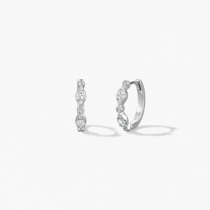 Hearts On Fire Bezel Regal Huggie