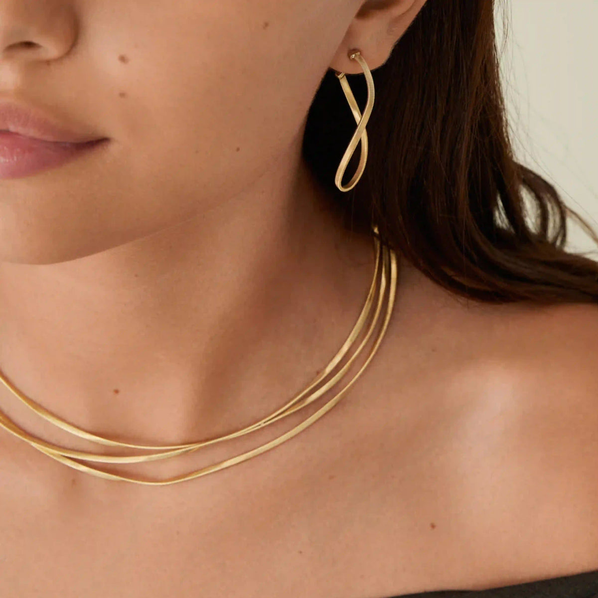 twisted irregular gold hoops