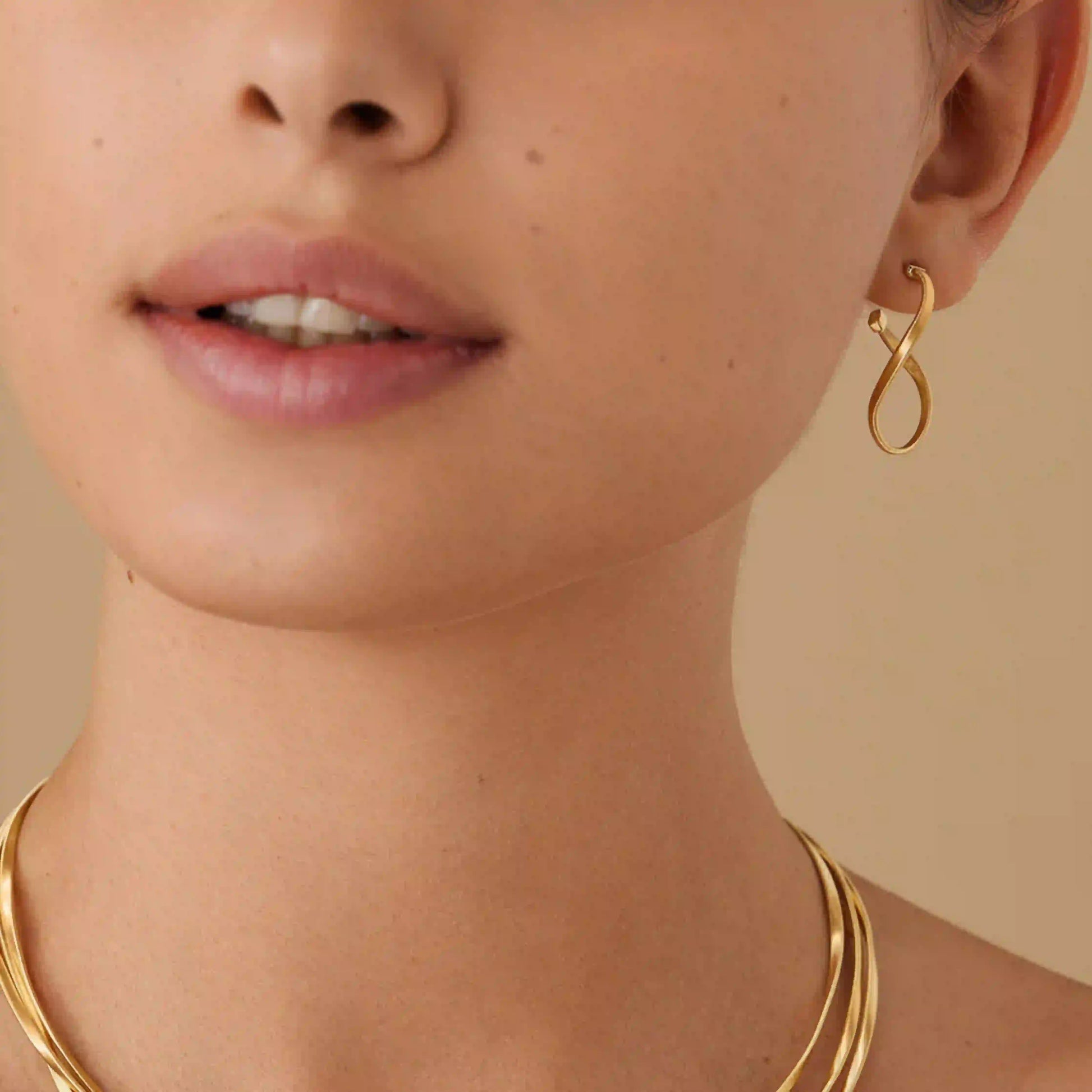Twisted irregular gold hoops 