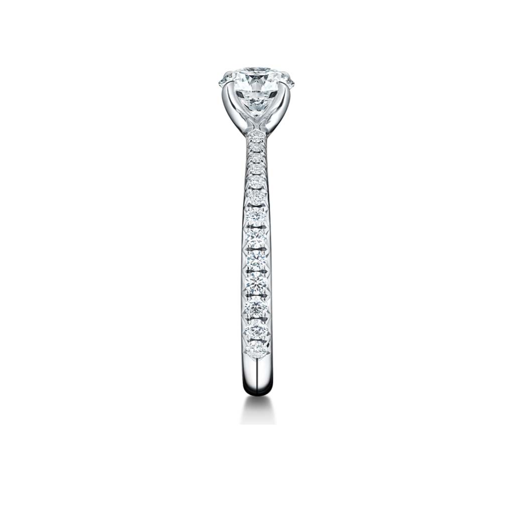 platinum Vela solitaire ring with diamond band 