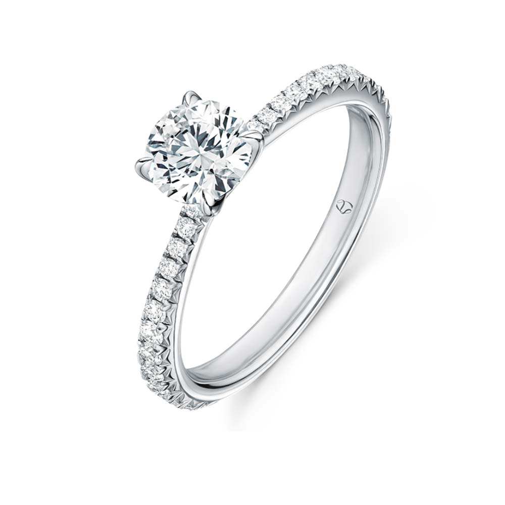 platinum Vela solitaire ring with diamond band 