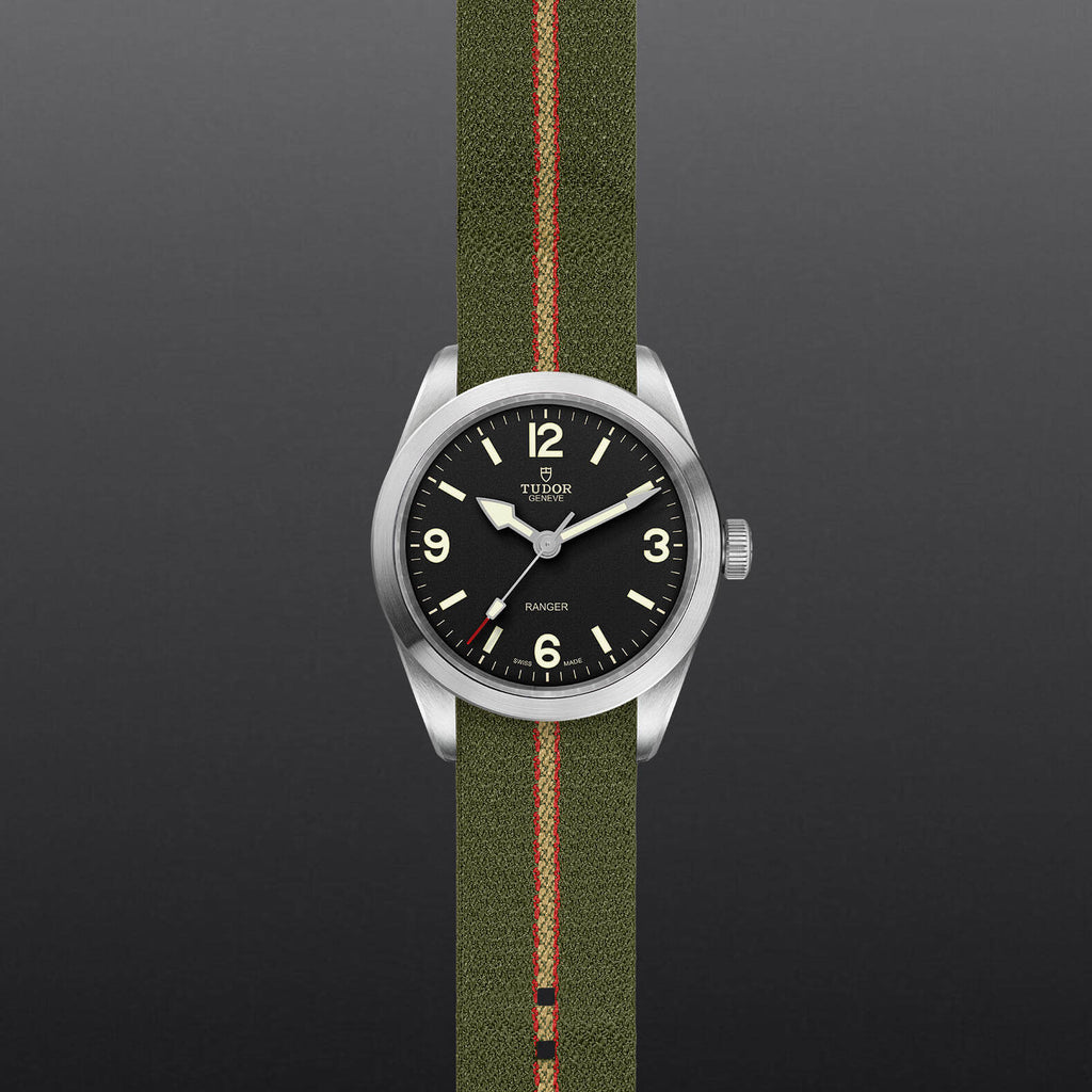 shown on model, tudor, ranger, fabric strap, black dial