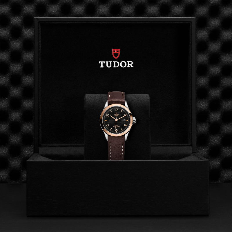 28mm, tudor, watch, brown leather strap, black dial, rose gold markers and bezel, steel case, date