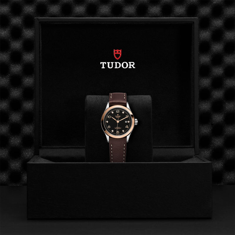 tudor, 1926, steel and rose gold, brown leather strap, black dial, diamond accents, 28mm