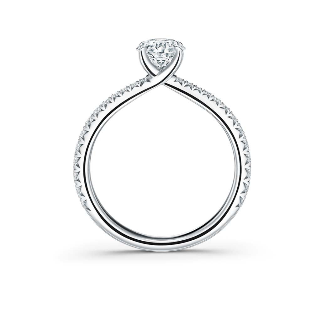 platinum Vela solitaire ring with diamond band 